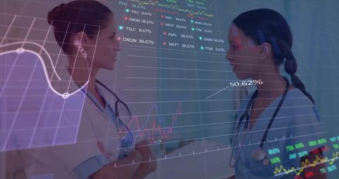 Medical Professionals Analyzing Financial Data in Hospital Setting