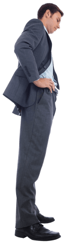 Serious Businessman Standing with Hands on Hips in Suit on Transparent Background