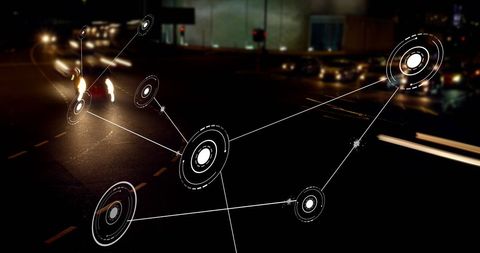 Digital Network Connections on Cars at Night
