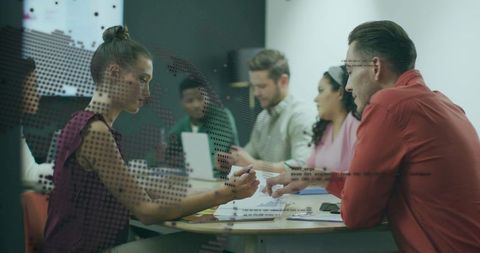 Team Collaboration in Modern Conference Room with Focus on Strategy