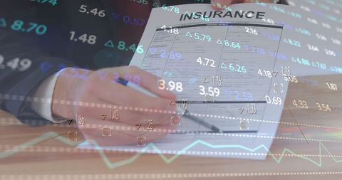 Businessman Analyzing Insurance Policy with Financial Data Overlay