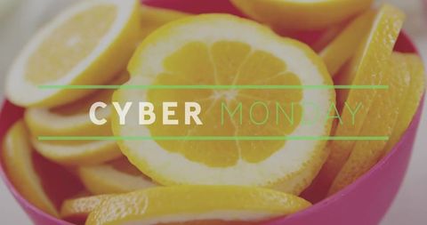 Cyber monday sale banner with bright sliced lemon in pink bowl, modern retail graphic