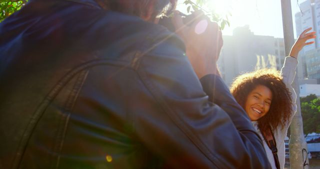 Photographer Capturing Smiling Woman Posing Outdoors - Download Free Stock Images Pikwizard.com