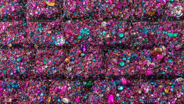 Magenta bejeweled quilted panel with multicolor glitter and faceted rhinestones