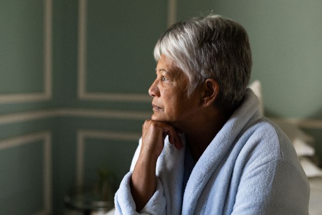Senior African American Woman Reflecting in Bedroom - Download Free Stock Photos Pikwizard.com