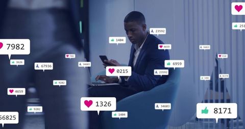 Business Professional Engaged with Social Media Insights in Modern Office Lounge