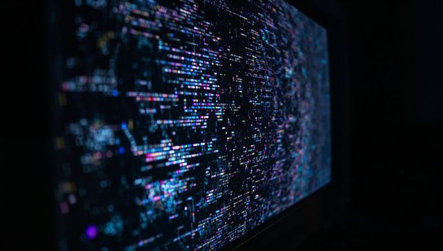 Glitching Multicolored Code Streaks on Wide Monitor