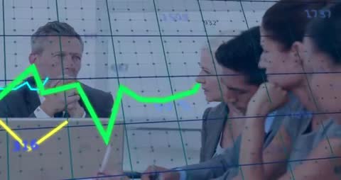 Team Analyzing Data with Real-Time Financial Graphs