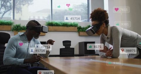 Business professionals collaborating with vr headsets at boardroom table with ar analytics