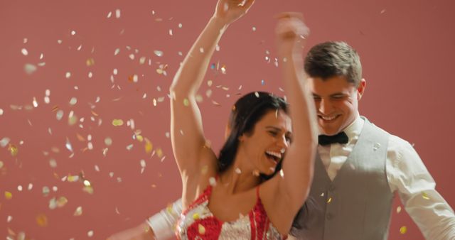 Caucasian couple celebrates joyfully, with copy space - Download Free Stock Photos Pikwizard.com