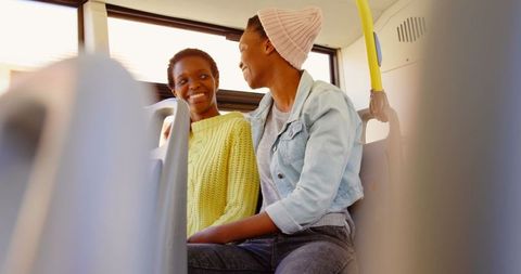 Sisters enjoying travel on public transport