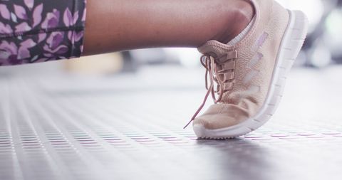 Athletic Woman Lunging with Kettlebells in Gym for Fitness - Download Free Stock Images Pikwizard.com
