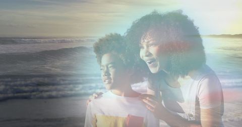 Joyful African American Mother and Son Enjoying Beach Day