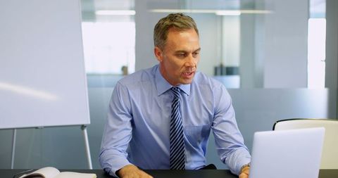 Businessman Presenting Online During Virtual Meeting