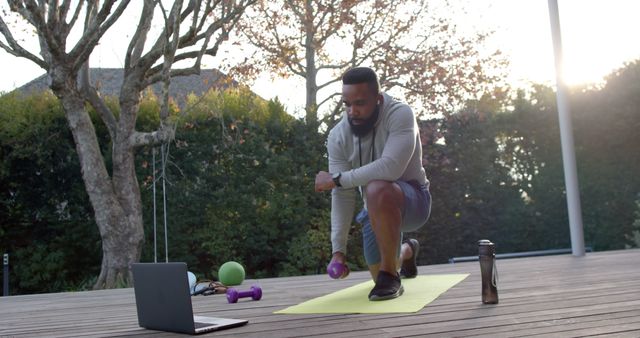 Man Exercising Outdoors with Weights During Online Fitness Class - Download Free Stock Images Pikwizard.com