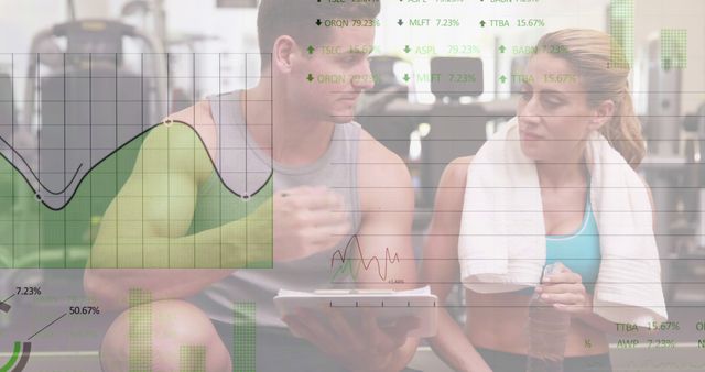 Composition of financial data processing over caucasian male fitness instructor and woman. Global sports, fitness, computing and data processing concept digitally generated image.