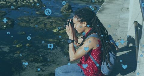 Woman with Dreadlocks Capturing Nature Photography Concepts