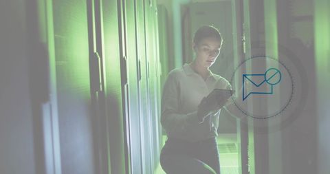 Female engineer using tablet in modern data center