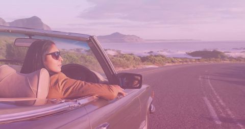 Biracial Couple Driving Convertible Along Scenic Coast - Download Free Stock Images Pikwizard.com