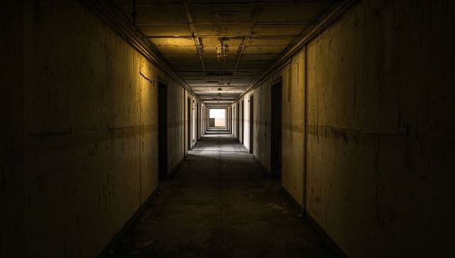 Abandoned corridor with gritty industrial atmosphere