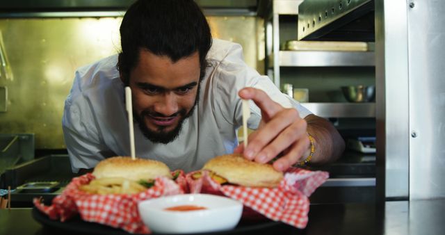 Chef Preparing Delicious Burgers in Restaurant Kitchen - Download Free Stock Images Pikwizard.com