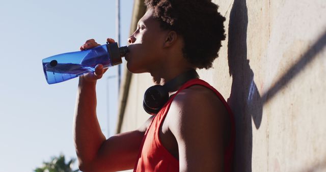 Man Hydrating After Workout with Water Bottle - Download Free Stock Images Pikwizard.com