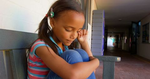 Sad African American Girl Crying on School Bench - Download Free Stock Images Pikwizard.com