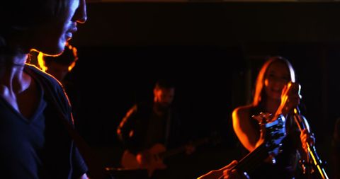Energetic Live Band Performance Under Stage Lights - Download Free Stock Images Pikwizard.com