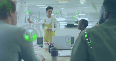 Diverse Team Discussing Sustainability in Modern Office