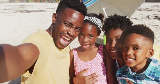 Smiling Family Taking Selfie on Beach Vacation - Download Free Stock Images Pikwizard.com