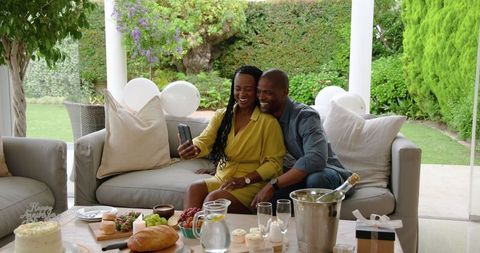 African American Couple Enjoys Relaxing Patio Moment