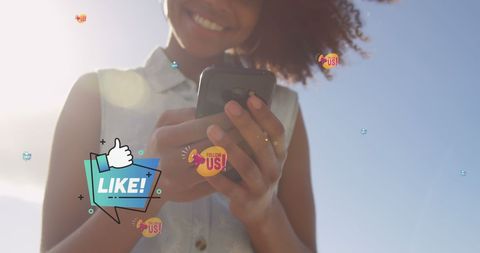 Joyful Woman Engaging with Social Media Apps Outdoors