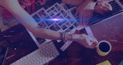 Creatives Collaborating at Modern Studio Desk