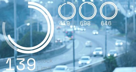 Futuristic digital hud overlay on highway traffic at dusk