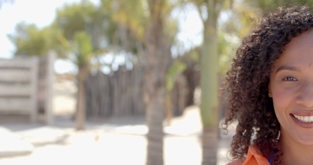 Smiling African American Woman Outdoors in Bright Environment - Download Free Stock Images Pikwizard.com