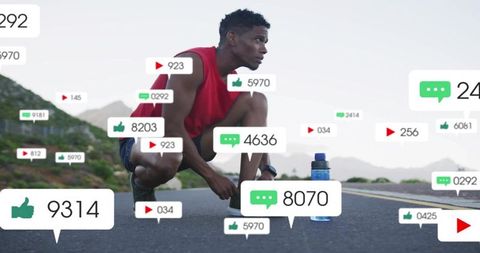 Athlete preparing for sprint on mountain road with floating social media icons