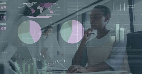 businesswoman analyzing financial data visualization in modern office - Download Free Stock Images Pikwizard.com