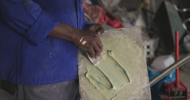 Close-Up of Hands Preparing Materials on Palette in Workshop - Download Free Stock Images Pikwizard.com