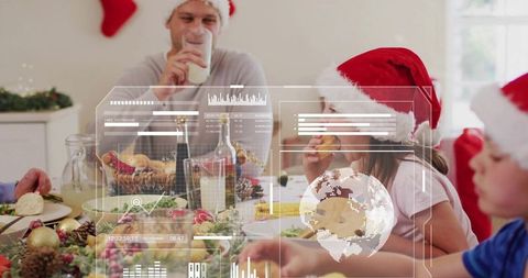 Family enjoying festive holiday meal with kids wearing santa hats and ar hud overlay
