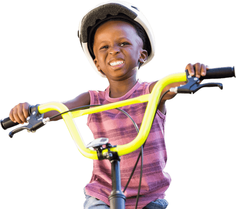 Joyful african american child riding bike transparent background