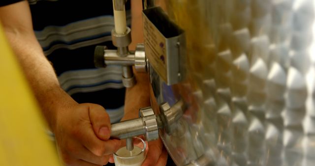 Person Pouring Fresh Milk from Stainless Steel Tank - Download Free Stock Images Pikwizard.com