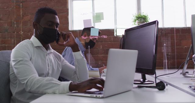 Business Professionals Working in Office with Protective Masks - Download Free Stock Images Pikwizard.com