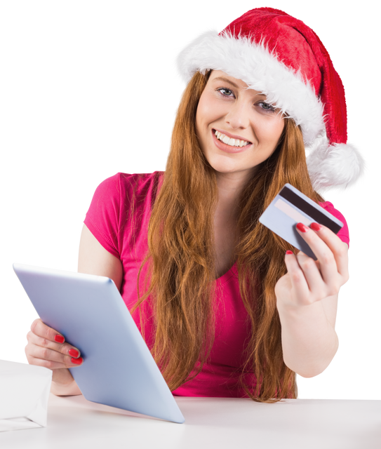 Festive Redhead Woman Shopping Online with Tablet, Santa Hat, Credit Card - Download Free Stock Videos Pikwizard.com