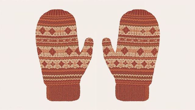 Featuring fair isle mittens in rust and cream, knitted winter gloves flatlay