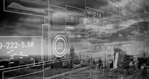 Futuristic Digital Displays Over Urban Skyline in Black and White
