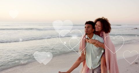 Romantic Beach Piggyback Ride with Heart Overlay at Sunset