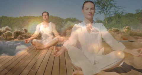 Couple meditating in peaceful outdoor cloud overlay