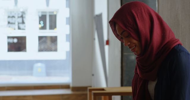 Young Muslim Woman Wearing Hijab Smiling Indoors - Download Free Stock Images Pikwizard.com