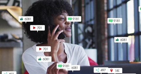 Confident Businesswoman Communicating on Smartphone with Social Media Buzz