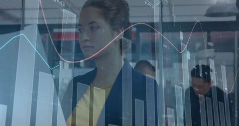 Caucasian Businesswoman Analyzing Financial Data with Digital Interface Overlay